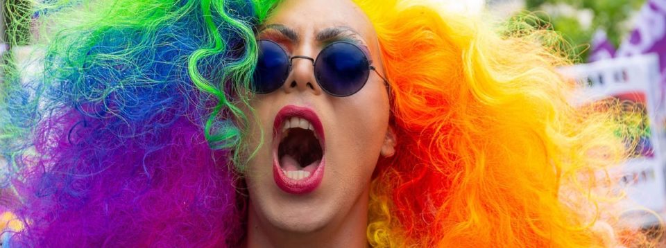 girl with rainbow hair screaming