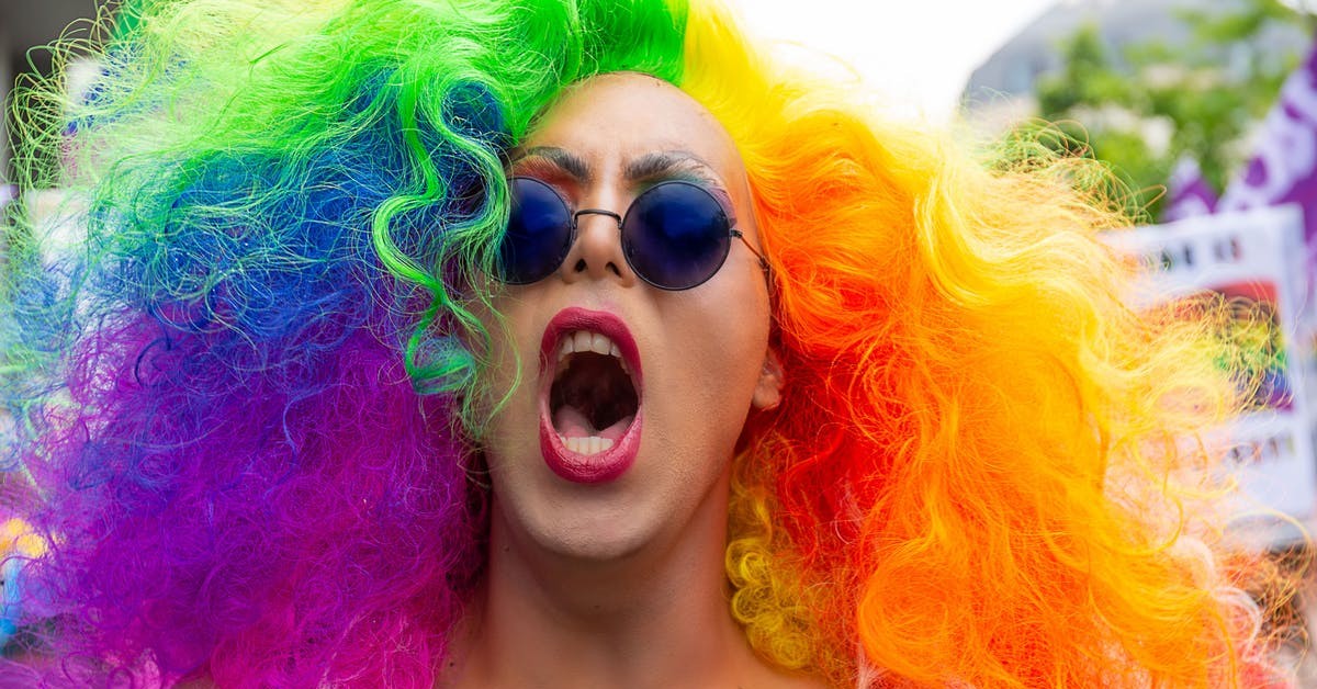girl with rainbow hair screaming