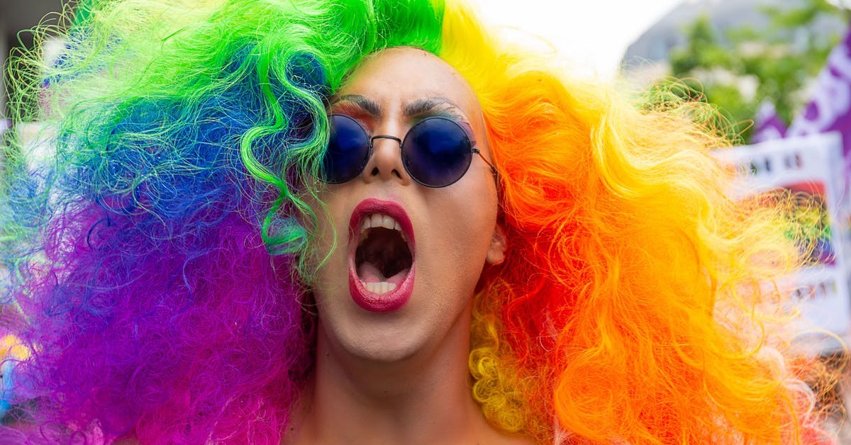 girl with rainbow hair screaming