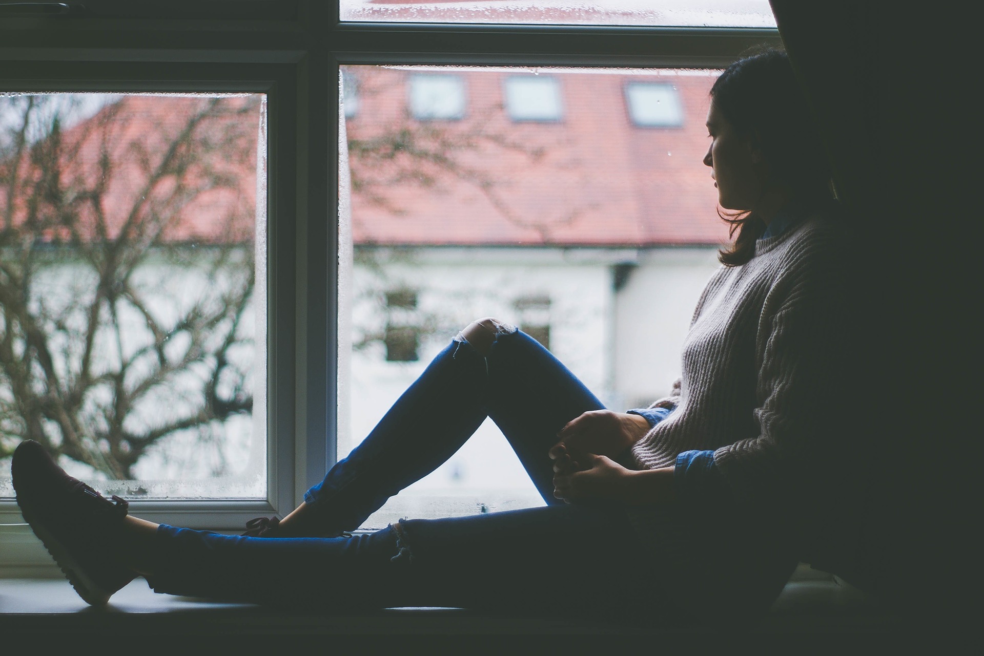 bipolar woman looking out window