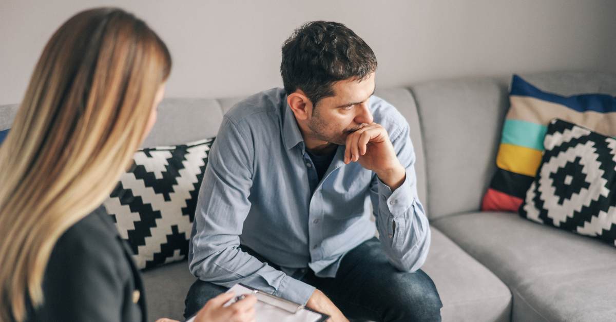 Individual going through a 1 on 1 counseling session with a therapist